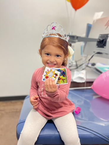 Happy Flagstaff Patient with Prizes